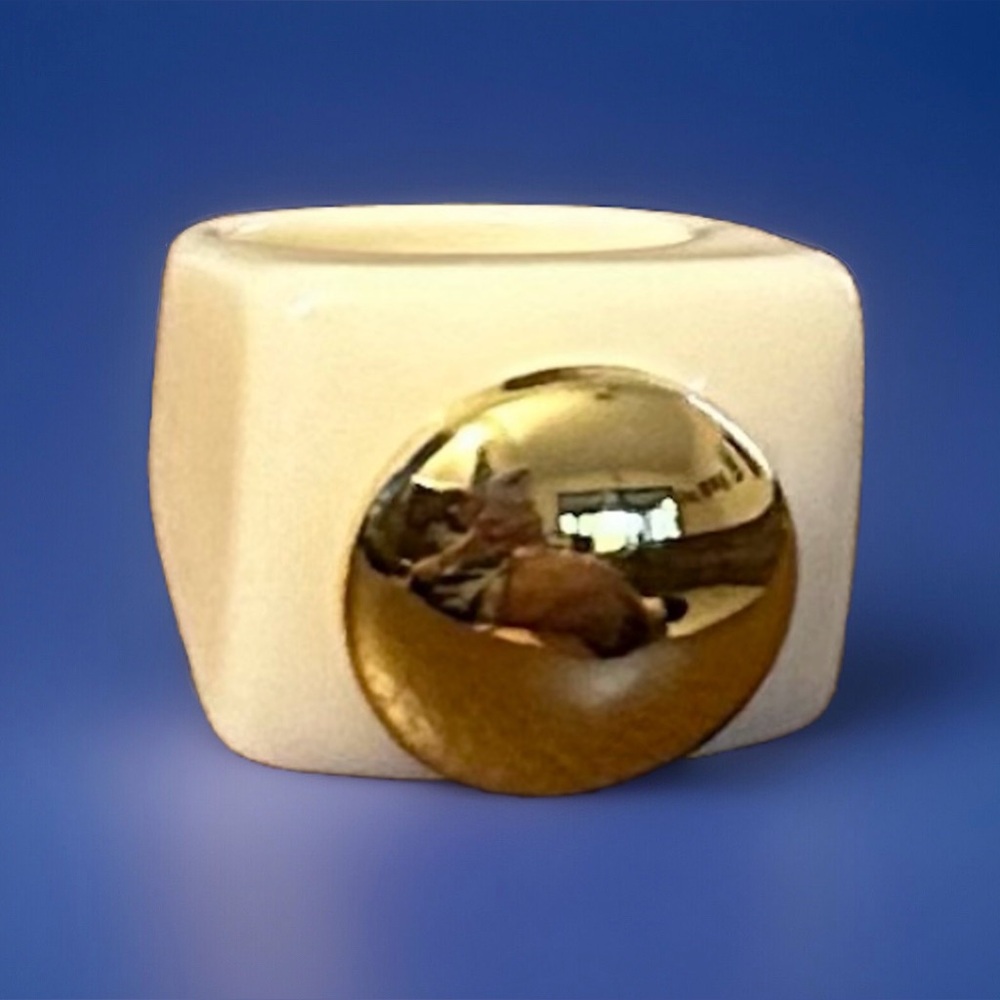Resin white with gold tone ring size 7